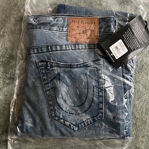 NEVER WORN, men’s TRUE RELIGION jeans.